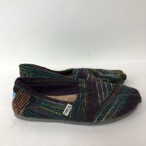 Selling toms shoes slip ons women size 7.5